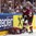 COLOGNE, GERMANY - MAY 7: Latvia's Guntis Galvins #58 tends to Oskars Cibulskis #27 after he was slashed by Slovakia's Libor Hudacek #79 (not shown) during preliminary round action at the 2017 IIHF Ice Hockey World Championship. (Photo by Andre Ringuette/HHOF-IIHF Images)

